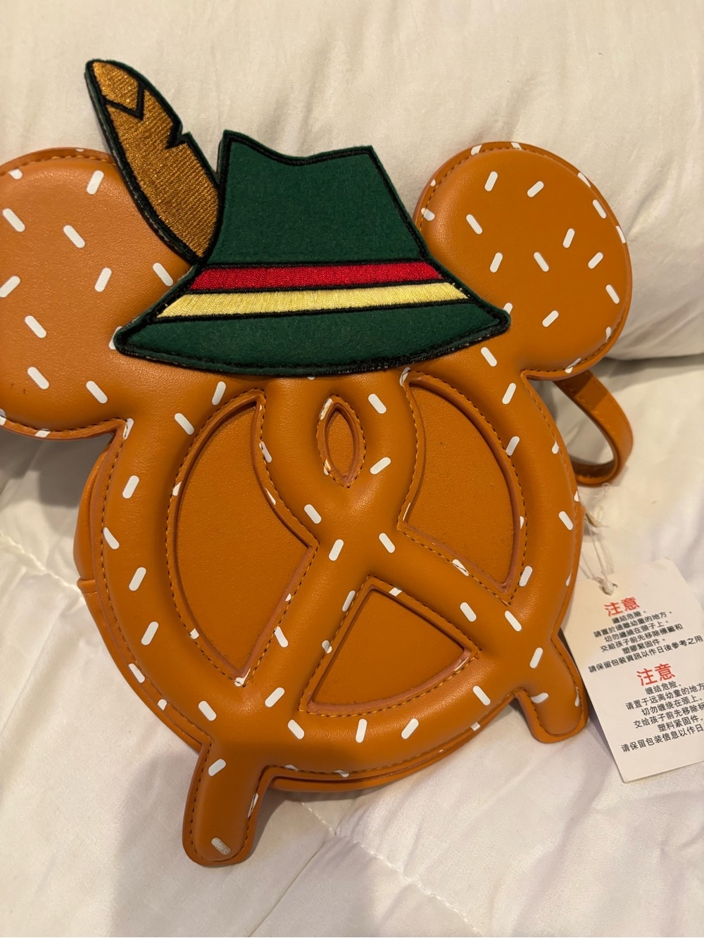 Disney Pretzel-Shaped Crossbody Bag with Green Hat Patch Germany/Epcot